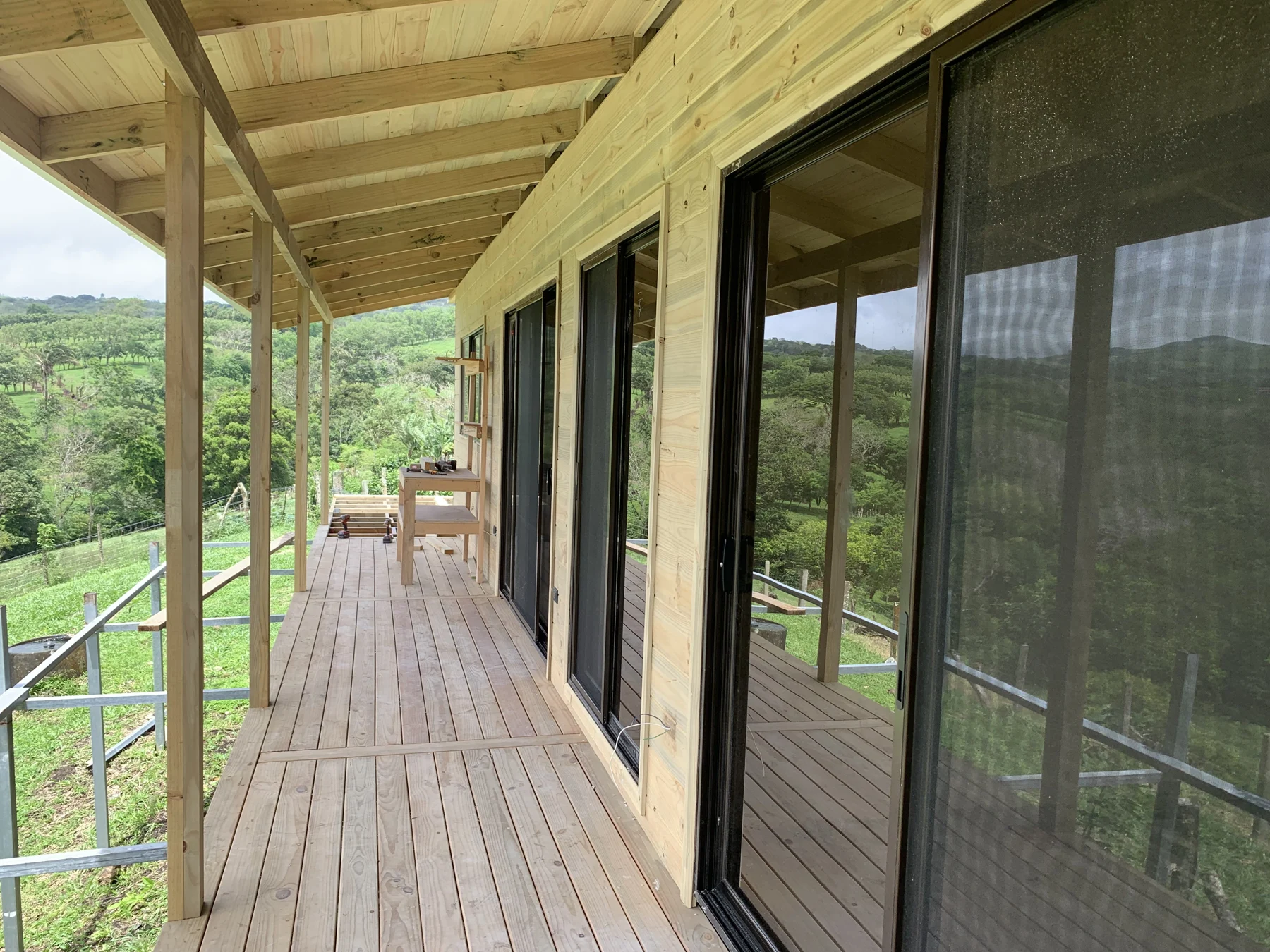 Covered terrace beside a home
